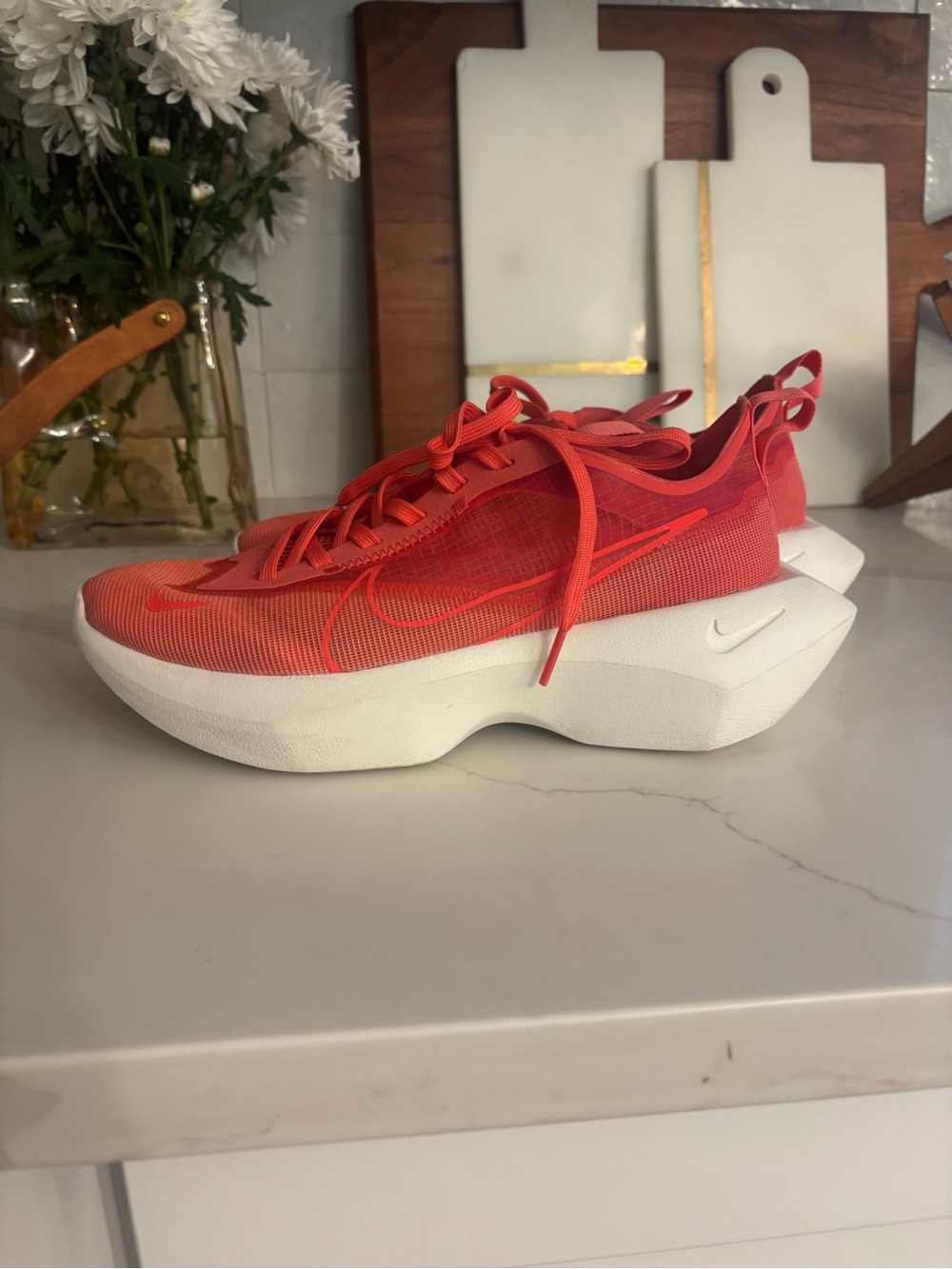 Nike Women’s red/coral Running Sneakers